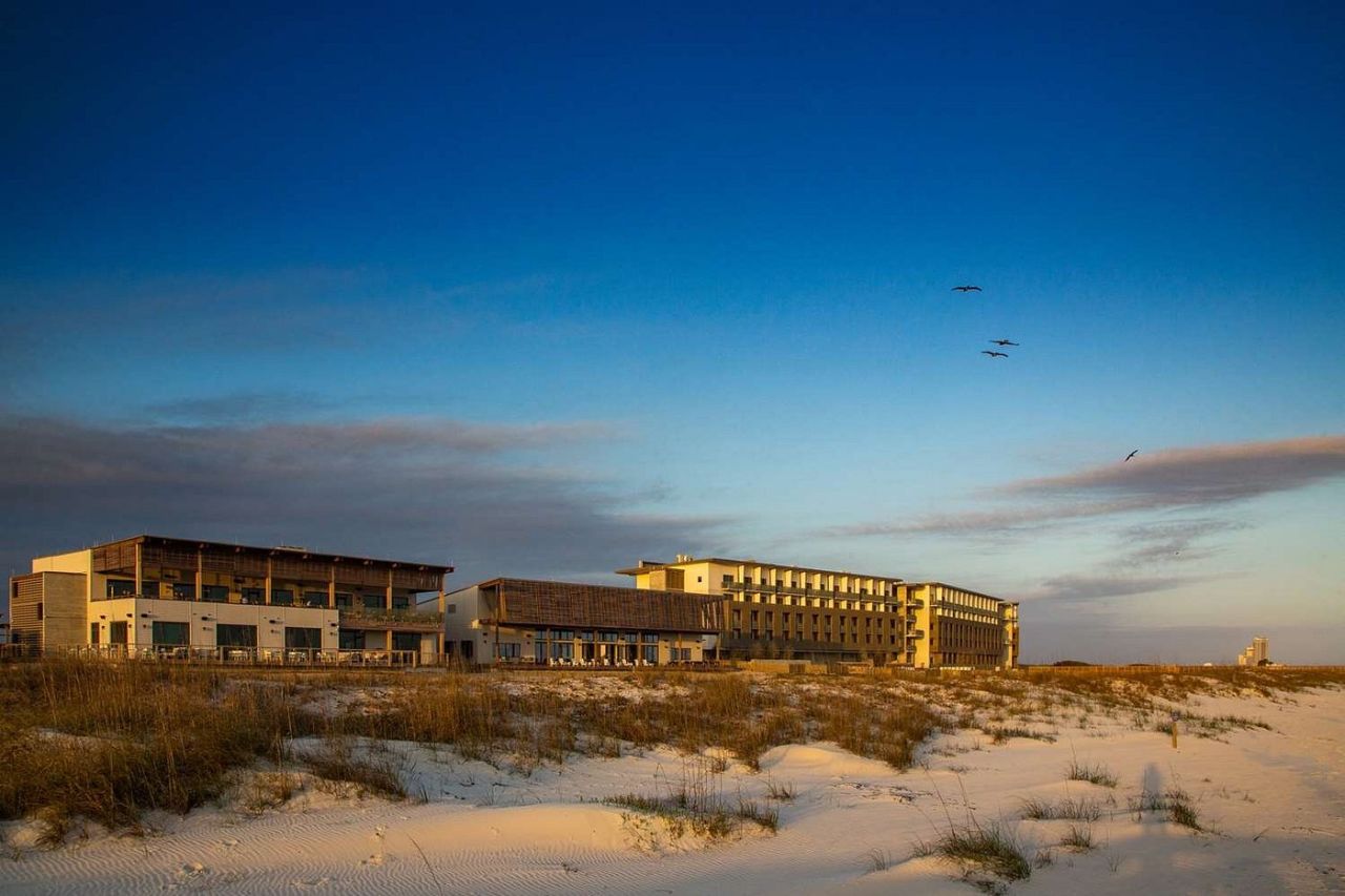 Hotel on a sandy beach beside the ocean
